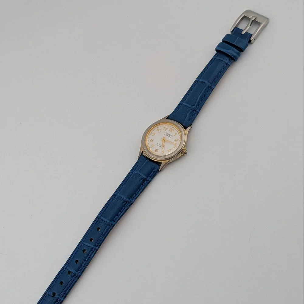 Embassy‎ by Gruen Ultra Thin Quartz Watch Gold Tone White Dial Blue Strap W1780